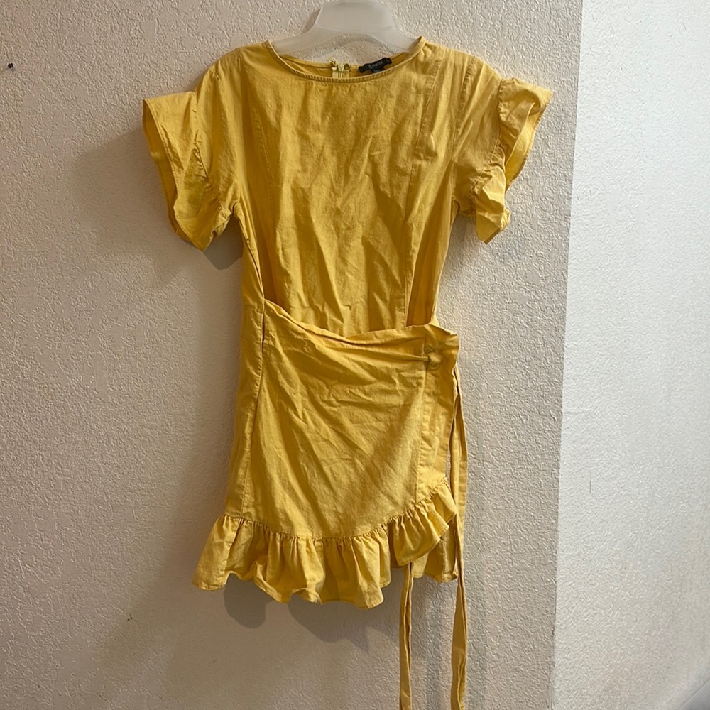 Yellow dress with ruffles